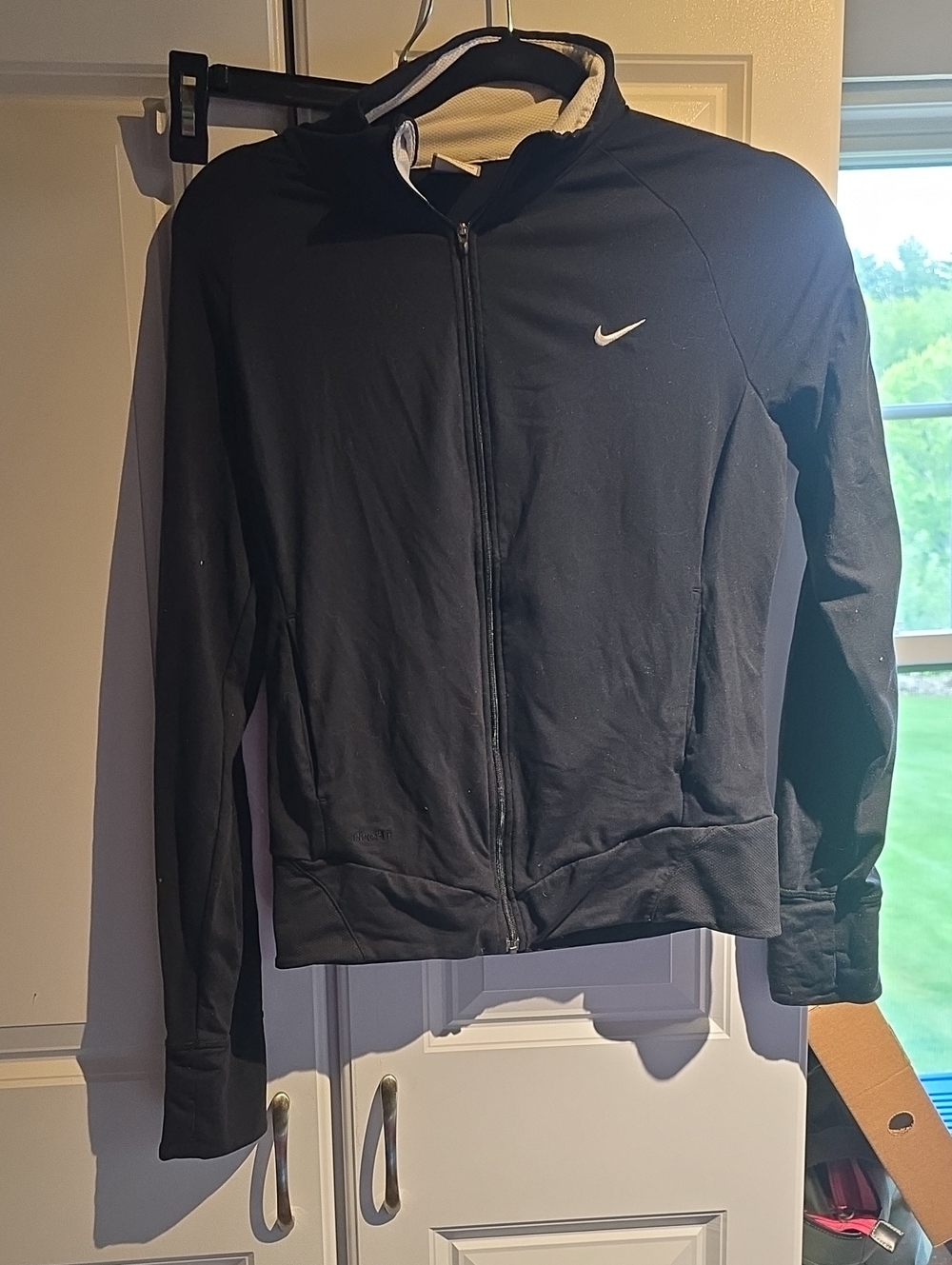 Nike Women's Black Zip-Front Utility Jacket with White Swoosh